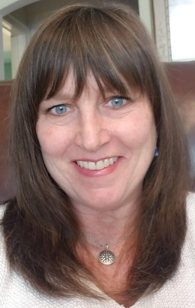 Picture of me. White woman, long brown hair and bangs. Blue eyes. 40+ years of age.
